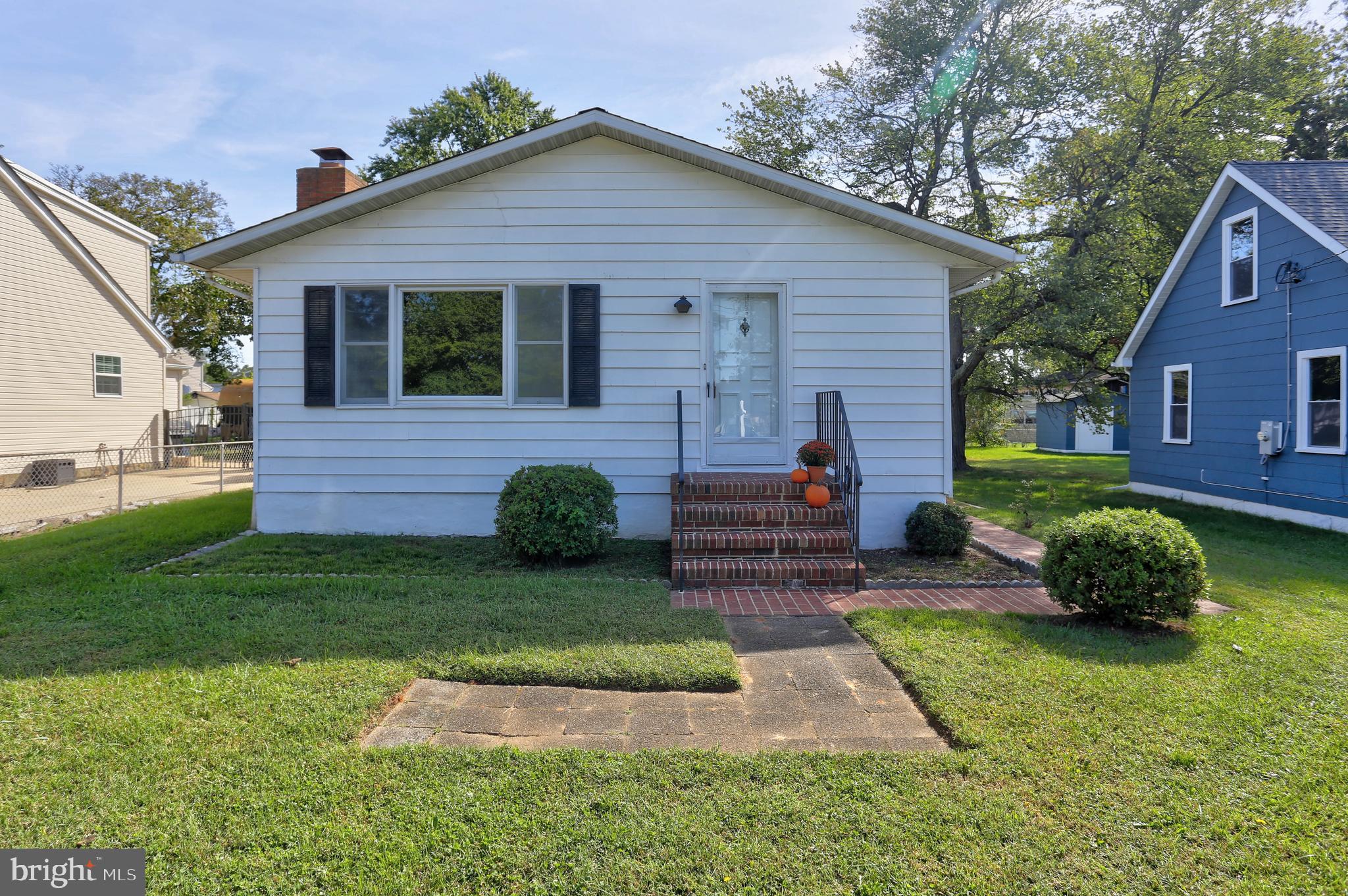 207 Greenland Beach Road Baltimore, MD 21226 - Photo 1 of 28 a view of a house with a yard