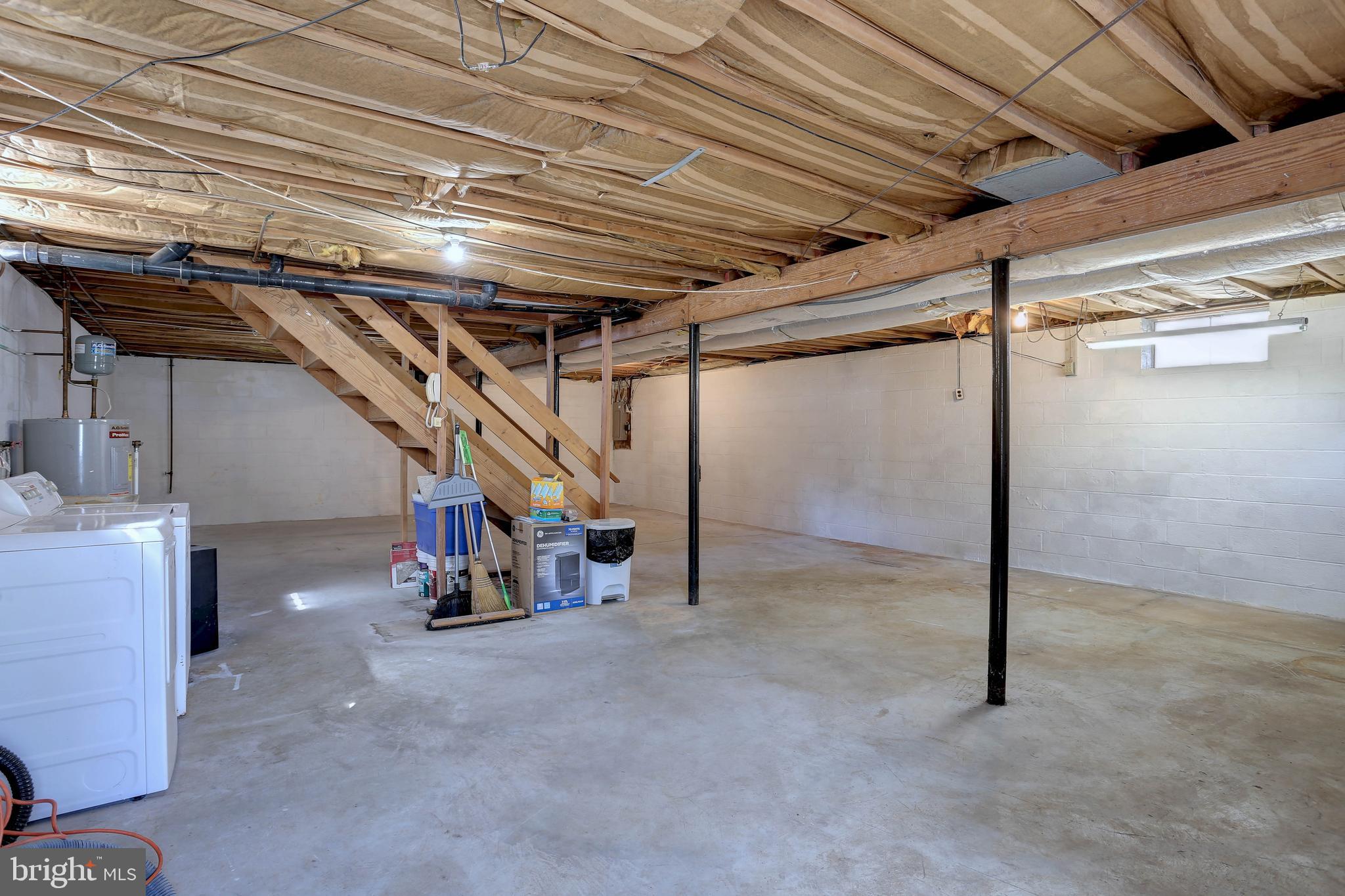 207 Greenland Beach Road Baltimore, MD 21226 - Photo 24 of 28 a view of empty room with wooden ceiling