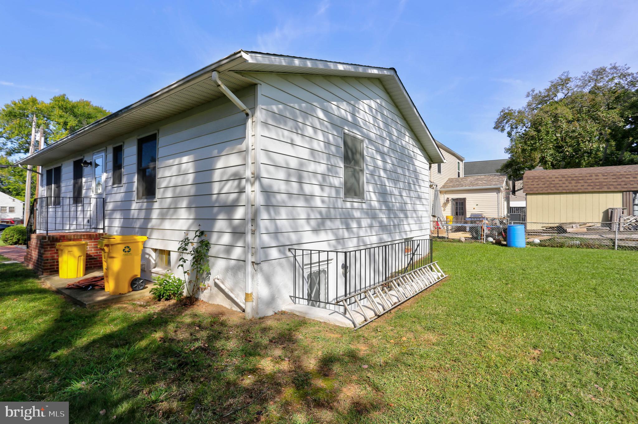 207 Greenland Beach Road Baltimore, MD 21226 - Photo 6 of 28 a view of a house with a yard