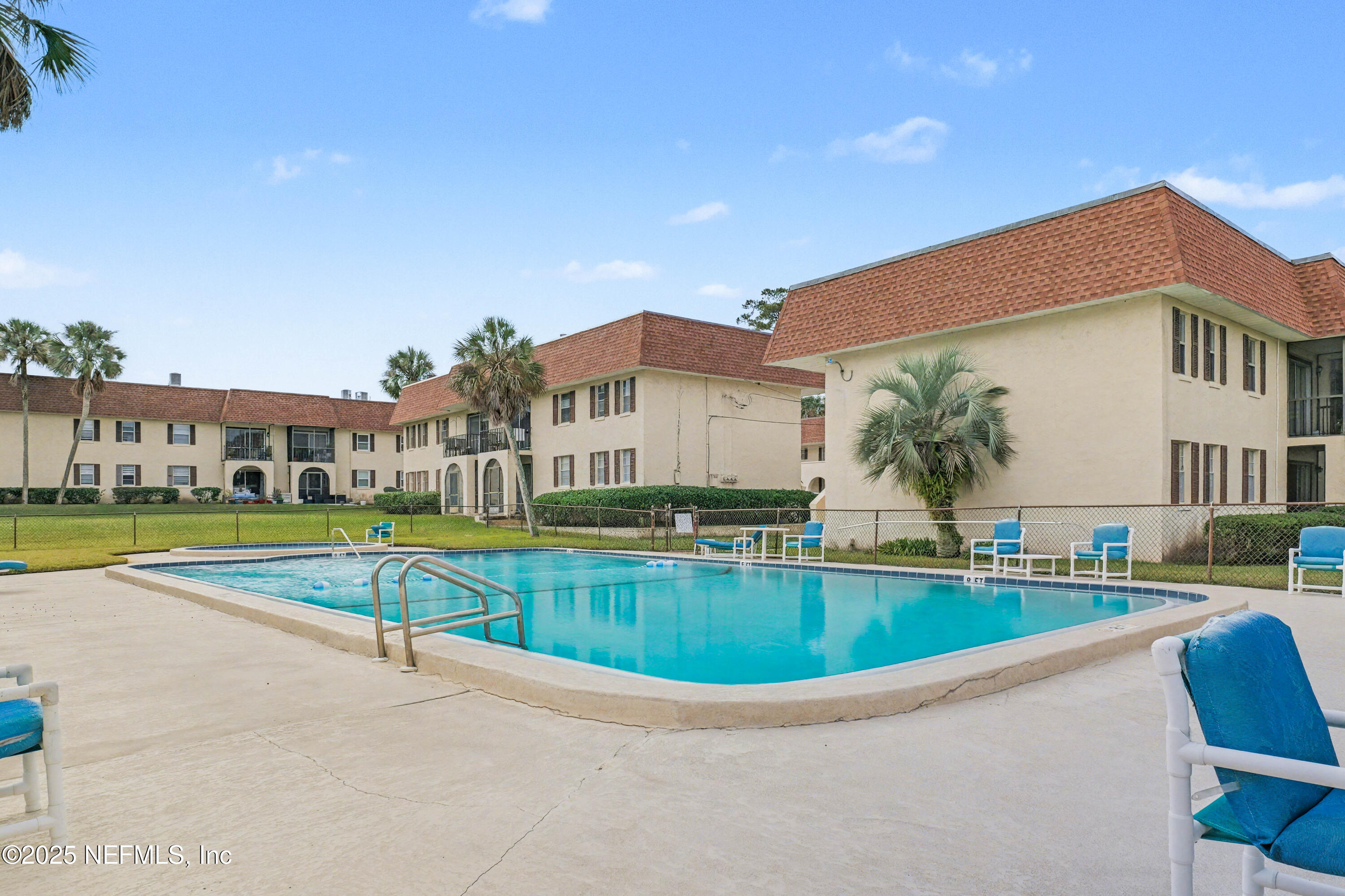1530 El Prado Road, Unit 1 Jacksonville, FL 32216 - Photo 2 of 15 a view of a house with a swimming pool