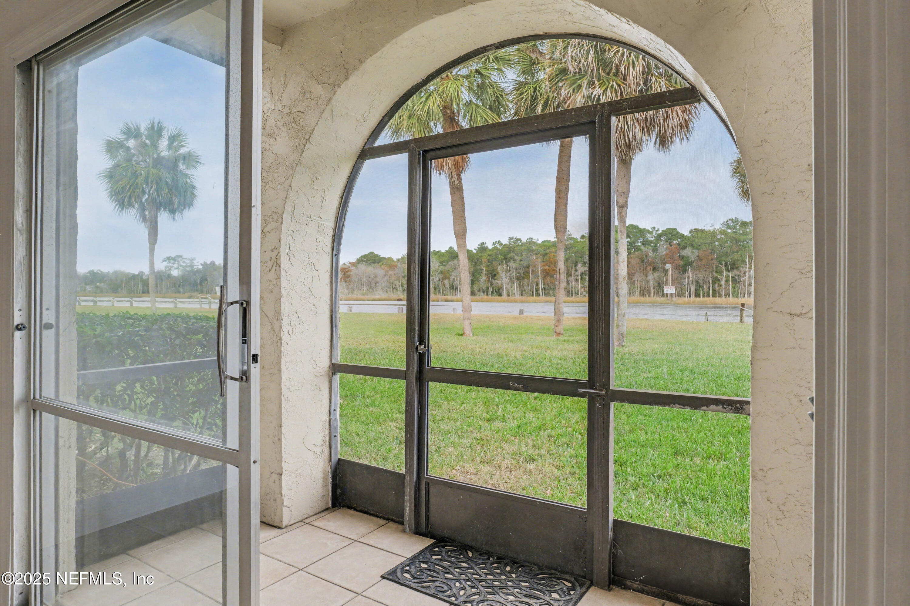 1530 El Prado Road, Unit 1 Jacksonville, FL 32216 - Photo 7 of 15 a view of an entryway with garden