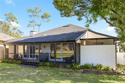 a view of a living room with a large window