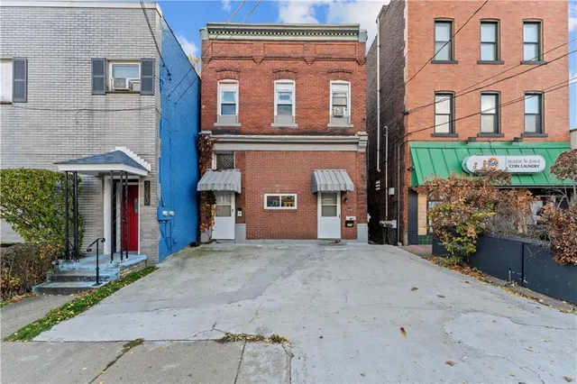 front view of a building with a street