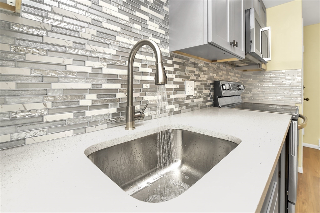 11 Greendale Road, Unit 2 Boston, MA 02126 - Photo 10 of 25 a close view of sink and tap