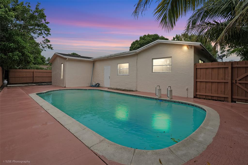 4971 Southwest 7th Court Margate, FL 33068 - Photo 14 of 15 a view of a backyard with a small cabin
