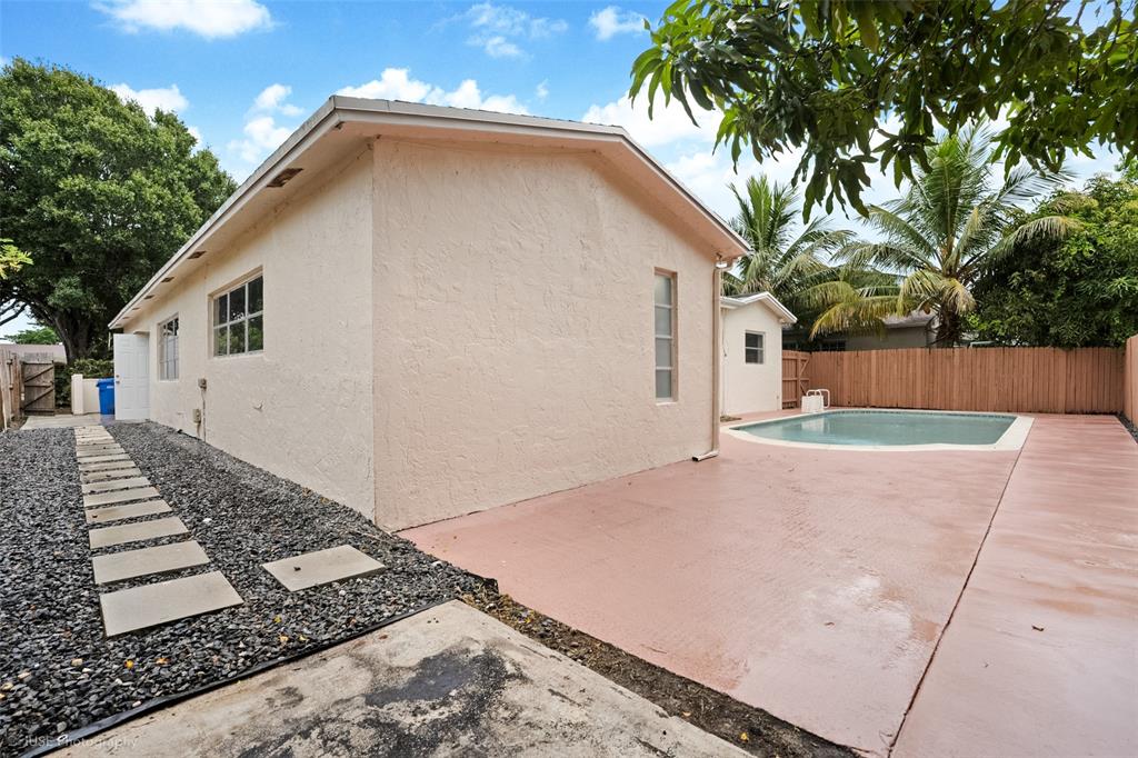 4971 Southwest 7th Court Margate, FL 33068 - Photo 15 of 15 a view of a backyard of the house