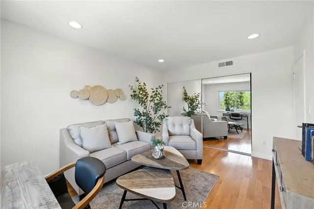 a living room with furniture and a couch