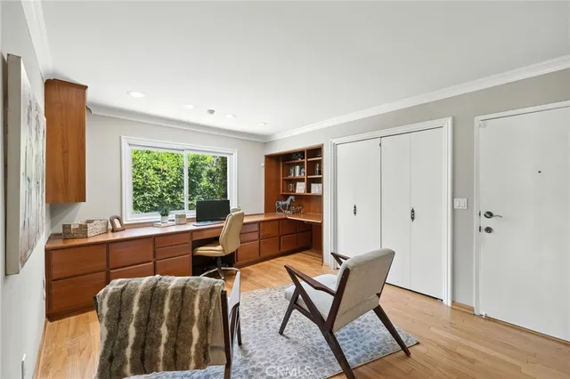 a work room with furniture and a window