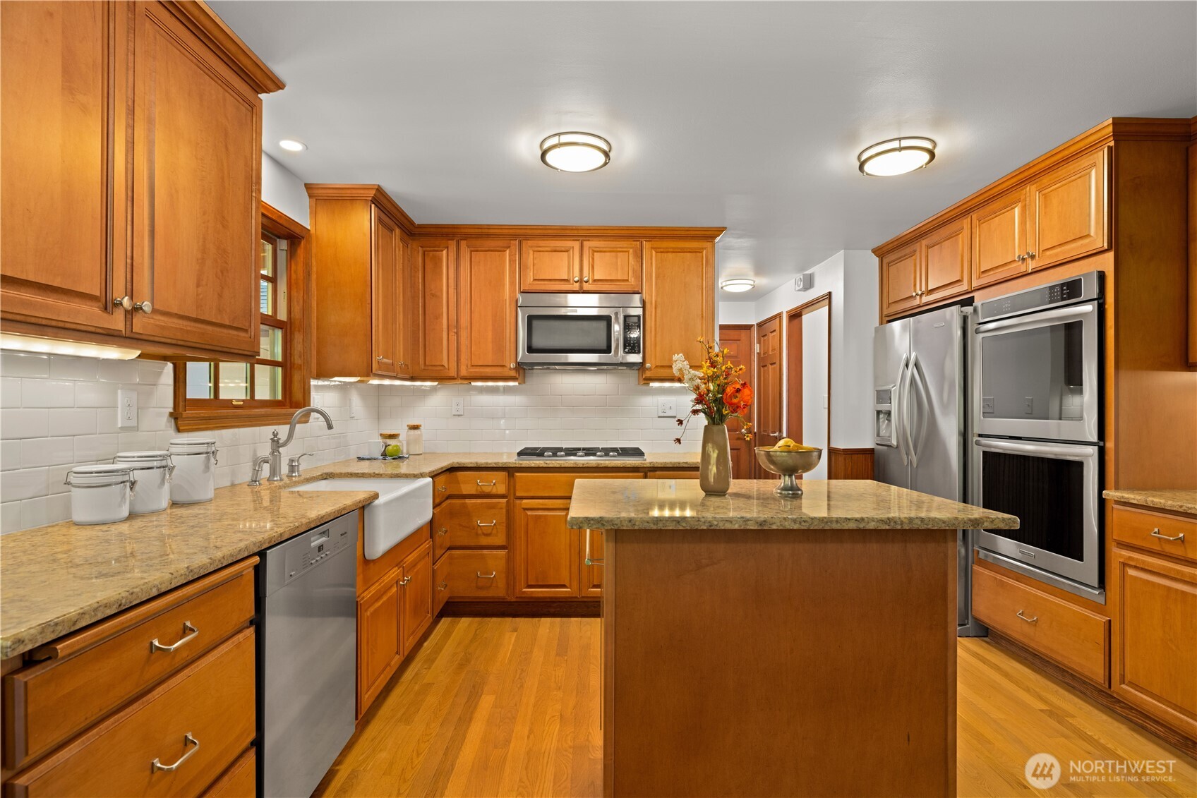 18615 81st Avenue West Edmonds, WA 98026 - Photo 13 of 37 a kitchen with stainless steel appliances granite countertop a sink stove and refrigerator