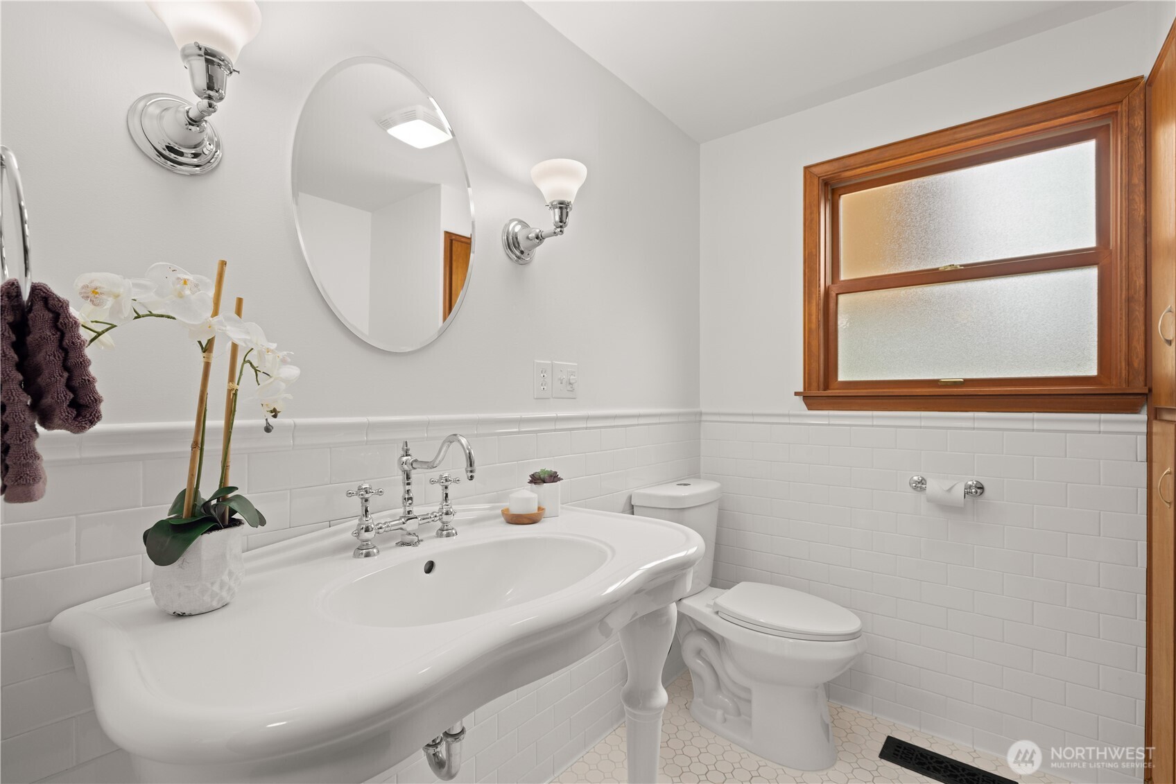 18615 81st Avenue West Edmonds, WA 98026 - Photo 14 of 37 a bathroom with a sink a toilet and a mirror