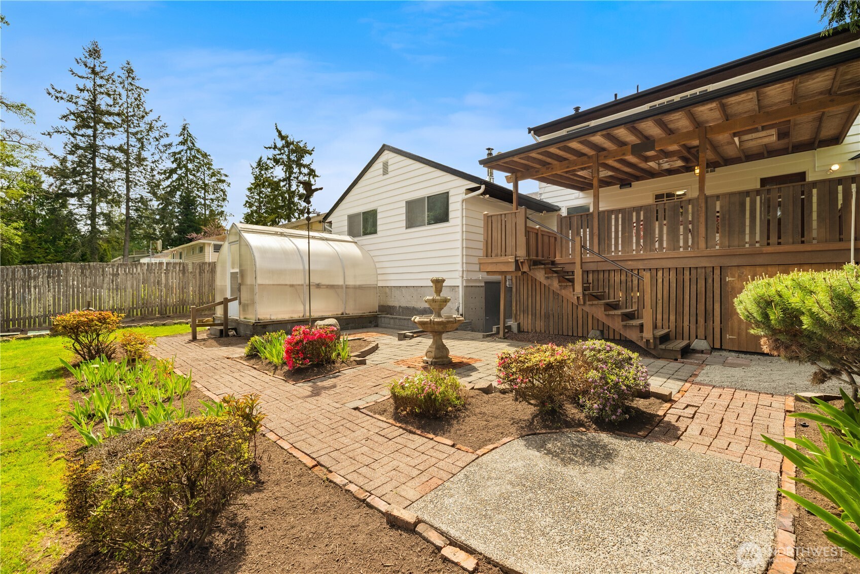 18615 81st Avenue West Edmonds, WA 98026 - Photo 29 of 37 a view of a backyard with a patio