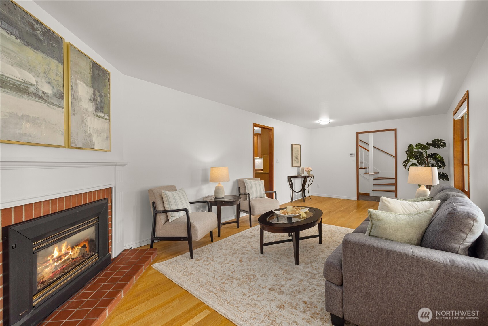 18615 81st Avenue West Edmonds, WA 98026 - Photo 5 of 37 a living room with furniture and a fireplace