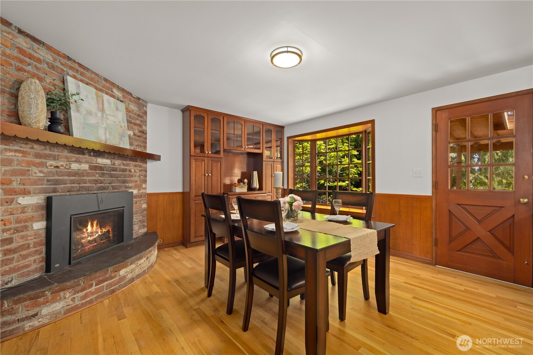 18615 81st Avenue West Edmonds, WA 98026 - Photo 6 of 37 a view of a dining room with furniture window and wooden floor