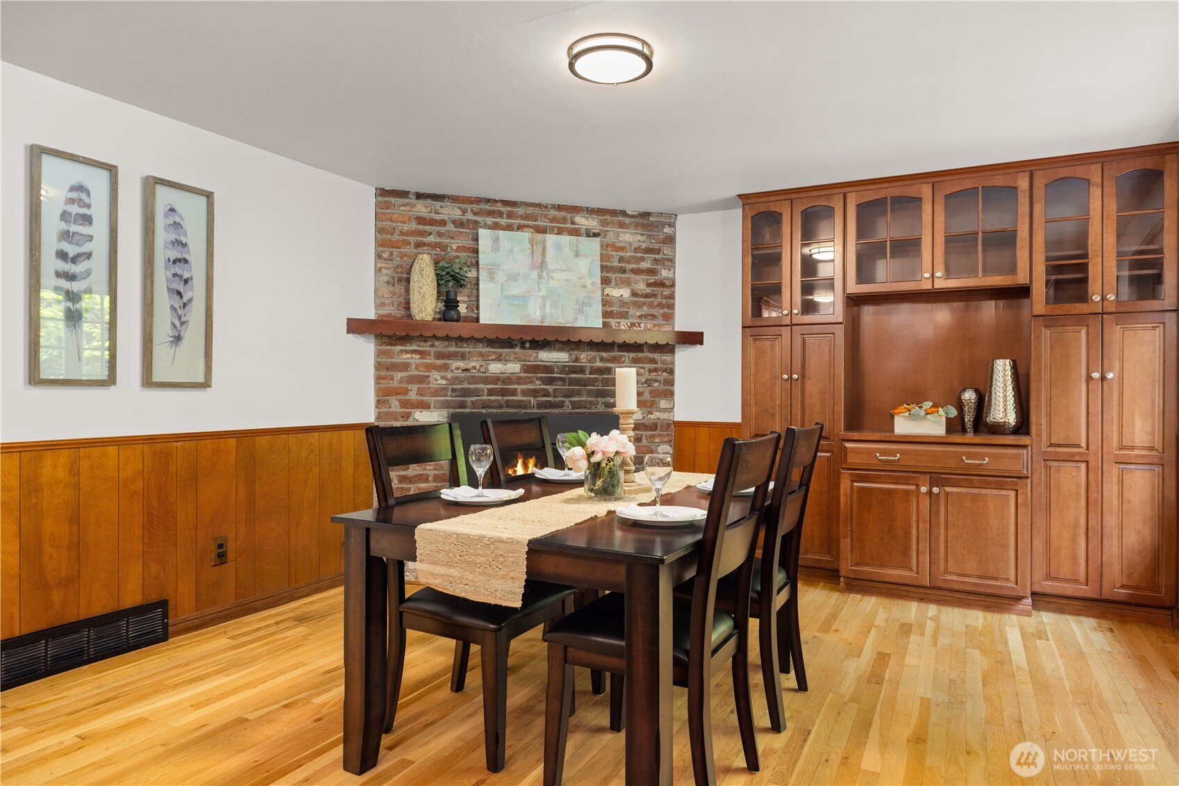 18615 81st Avenue West Edmonds, WA 98026 - Photo 9 of 37 a dining room with a wooden table and chairs