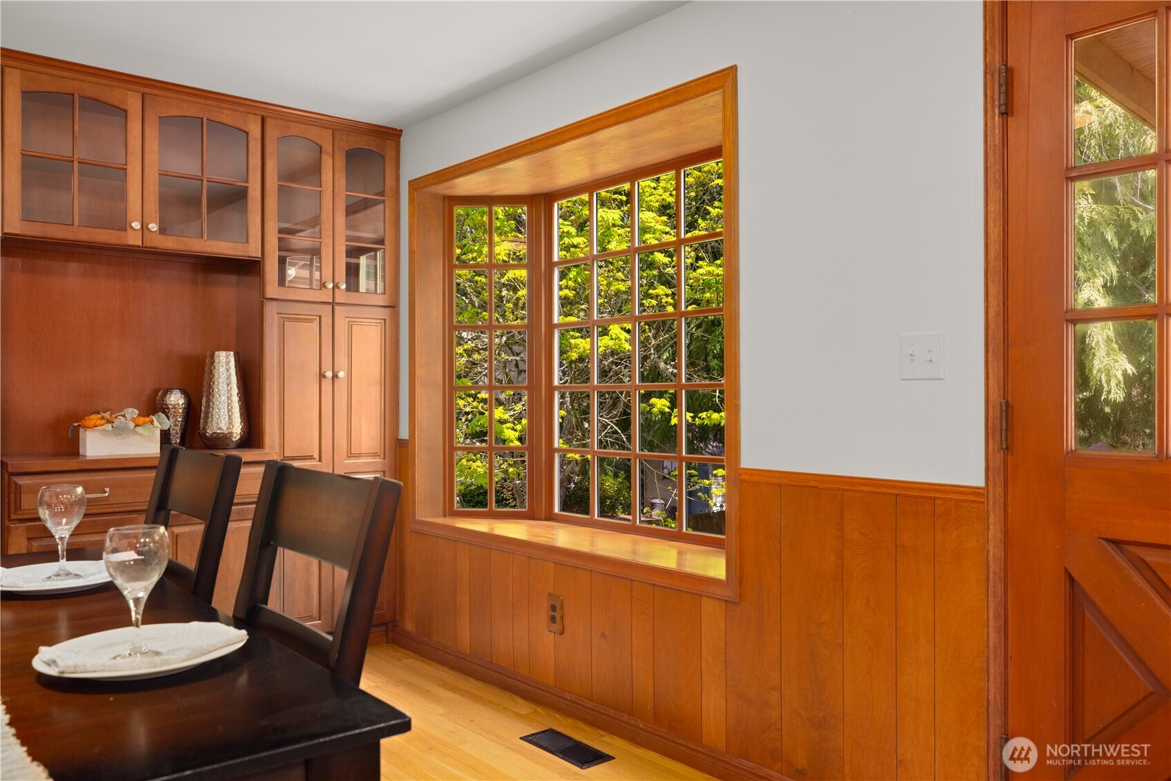 18615 81st Avenue West Edmonds, WA 98026 - Photo 10 of 37 a view of a dining room with furniture window and wooden floor