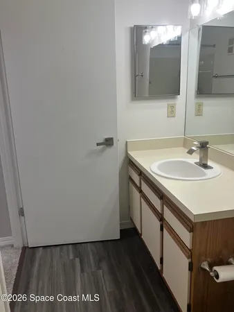 a bathroom with a toilet and a bath tub