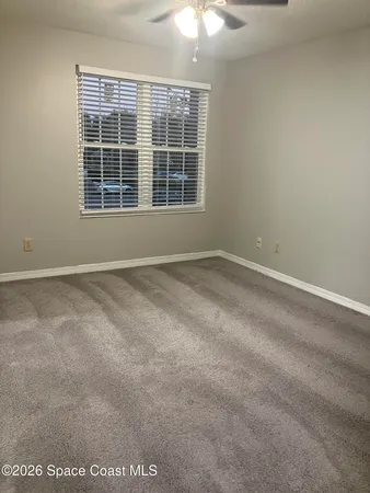 an empty room with a bathroom
