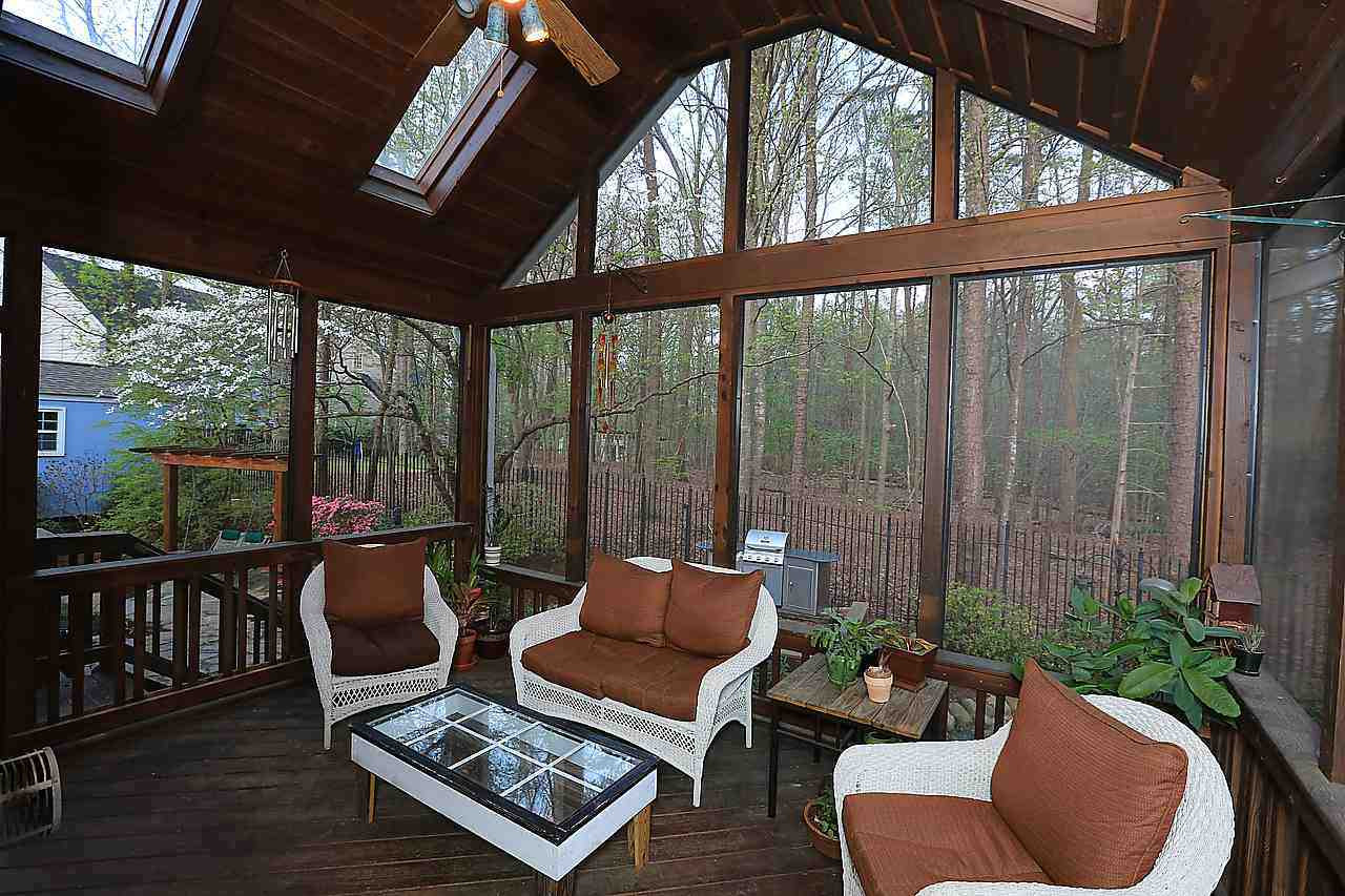 8536 Yucca Trail Raleigh, NC 27615 - Photo 15 of 23 Porch is very private and has built-in for your TV and skylights too! Screened Porch