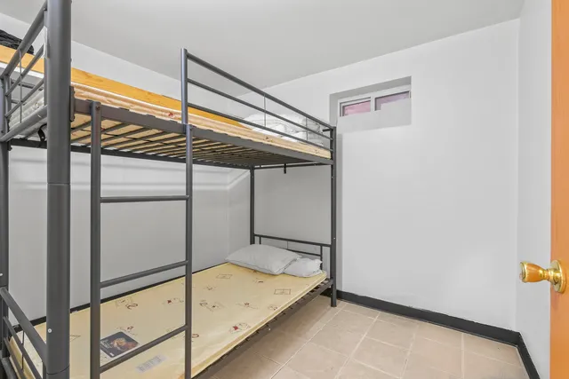 a bathroom with a tub and shower