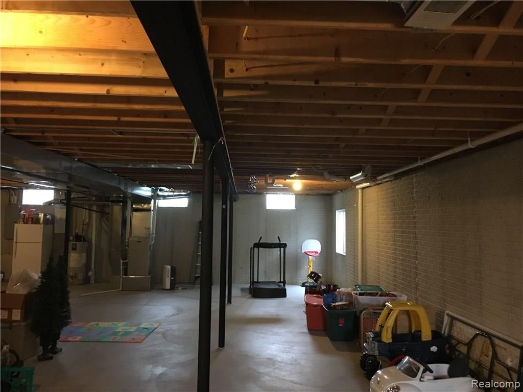 16191 Moore Park Road Macomb, MI 48044 - Photo 17 of 22 Huge basement ready to be finished!