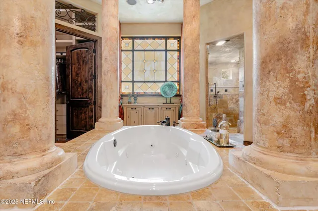 a front view of a house with a yard and a garage