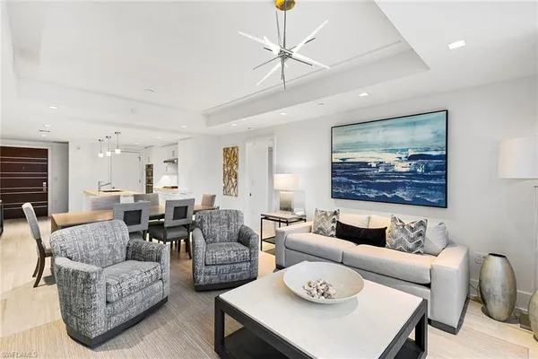 a living room with furniture and a table