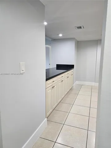 a bathroom with a toilet a sink and bathtub