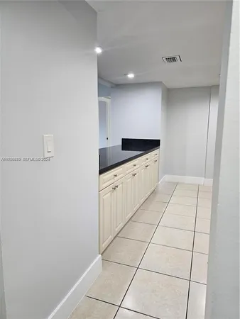 a bathroom with a toilet a sink and bathtub