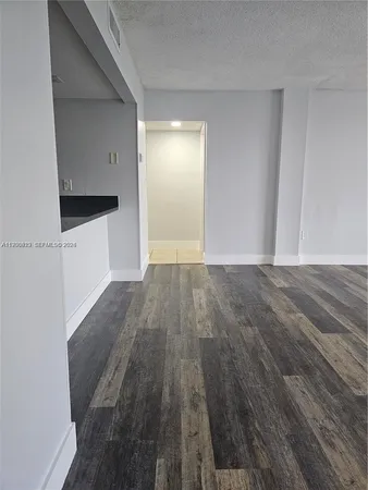 a view of a yard and front of a house