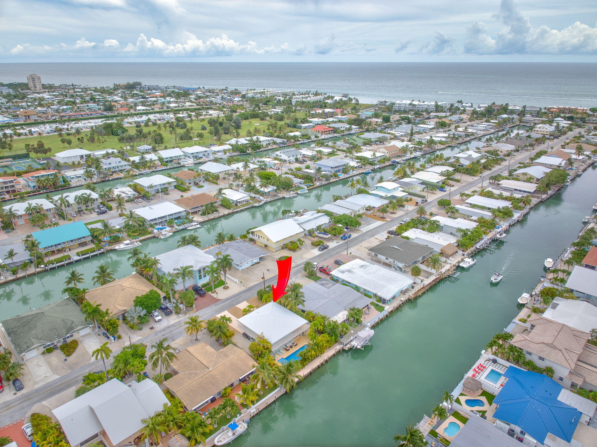 581 10th Street Key Colony Beach, FL 33051 - Photo 50 of 50 an aerial view of residential houses with outdoor space