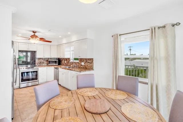 a kitchen with a refrigerator and countertop
