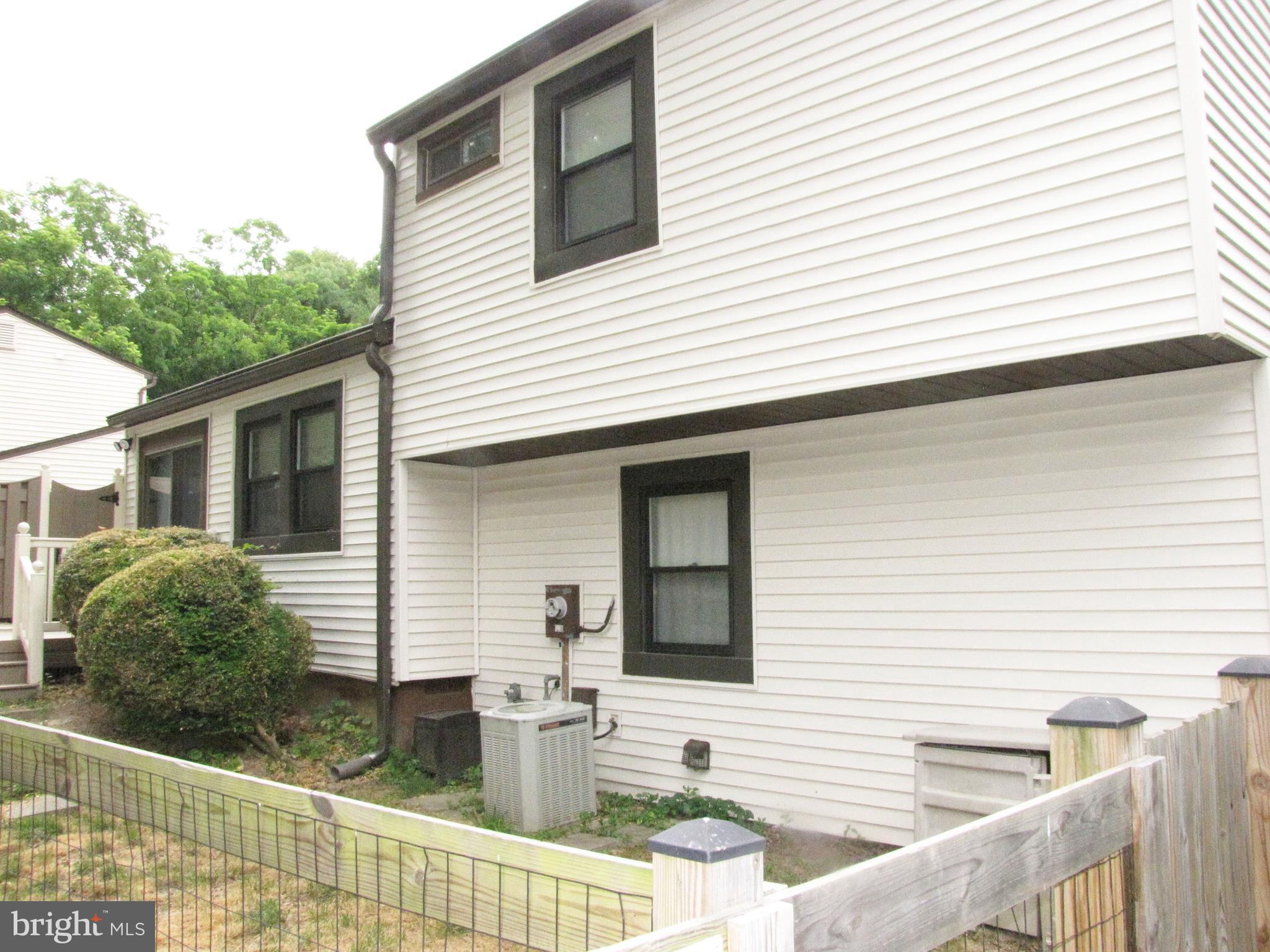 9600 Farewell Road Columbia, MD 21045 - Photo 16 of 18 a view of a house with a deck