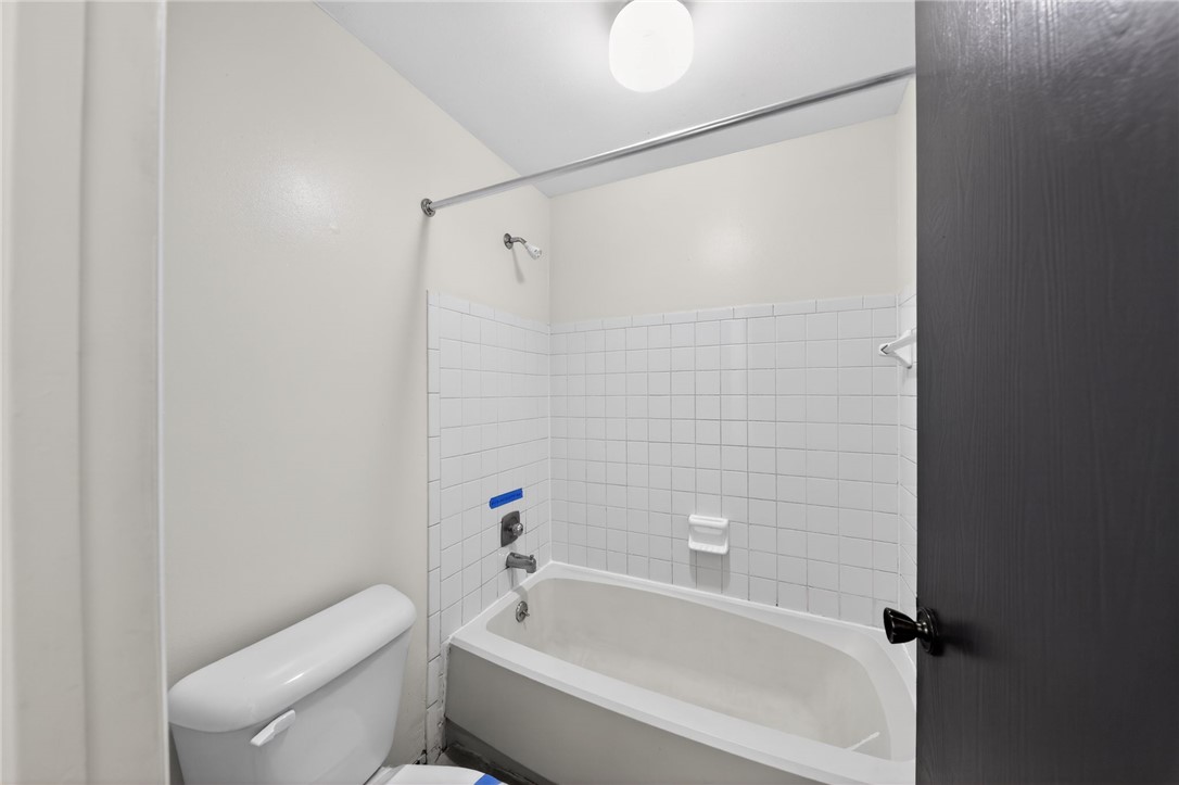 6070 Charlesgate Road Huber Heights, OH 45424 - Photo 23 of 29 This bathroom features a classic shower and tub combination, perfect for refreshing moments.