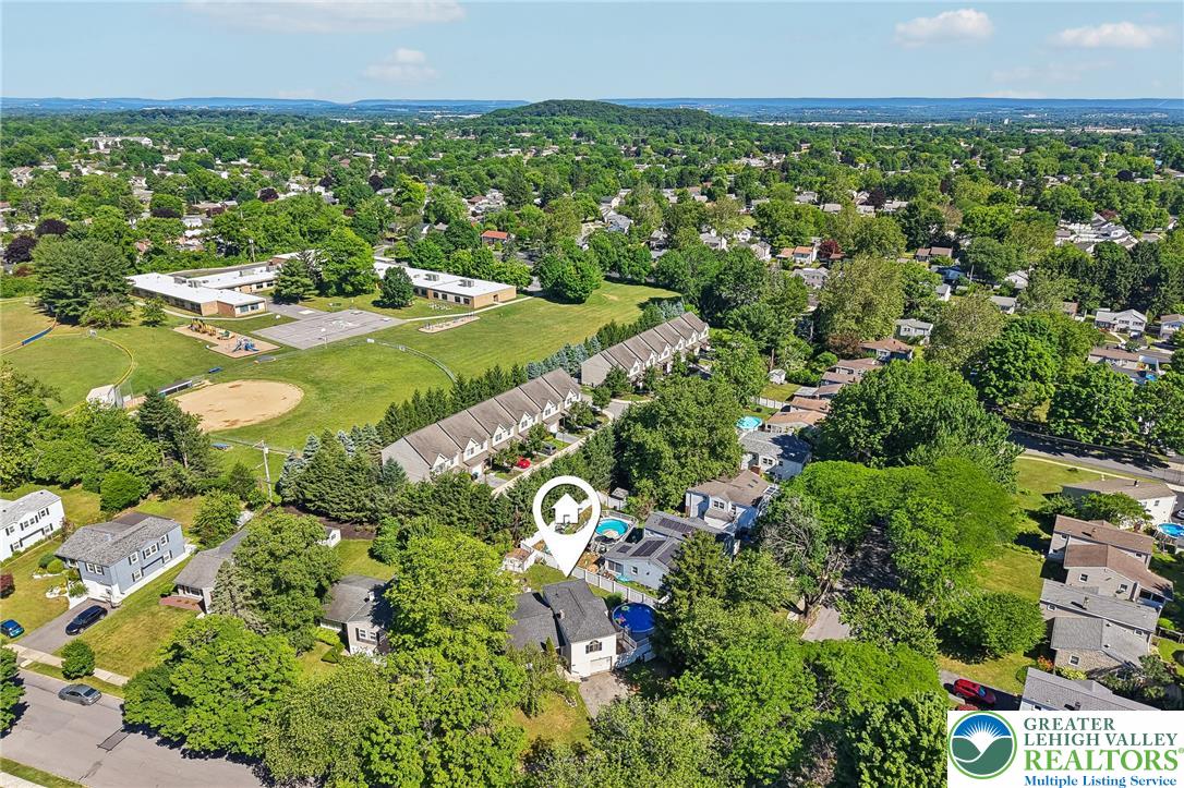 2649 Nottingham Road Bethlehem, PA 18017 - Photo 44 of 49 An aerial perspective reveals a vibrant neighborhood with residential properties, community facilities, and ample green spaces.
