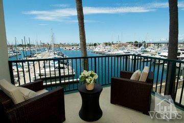a view of a balcony with chairs