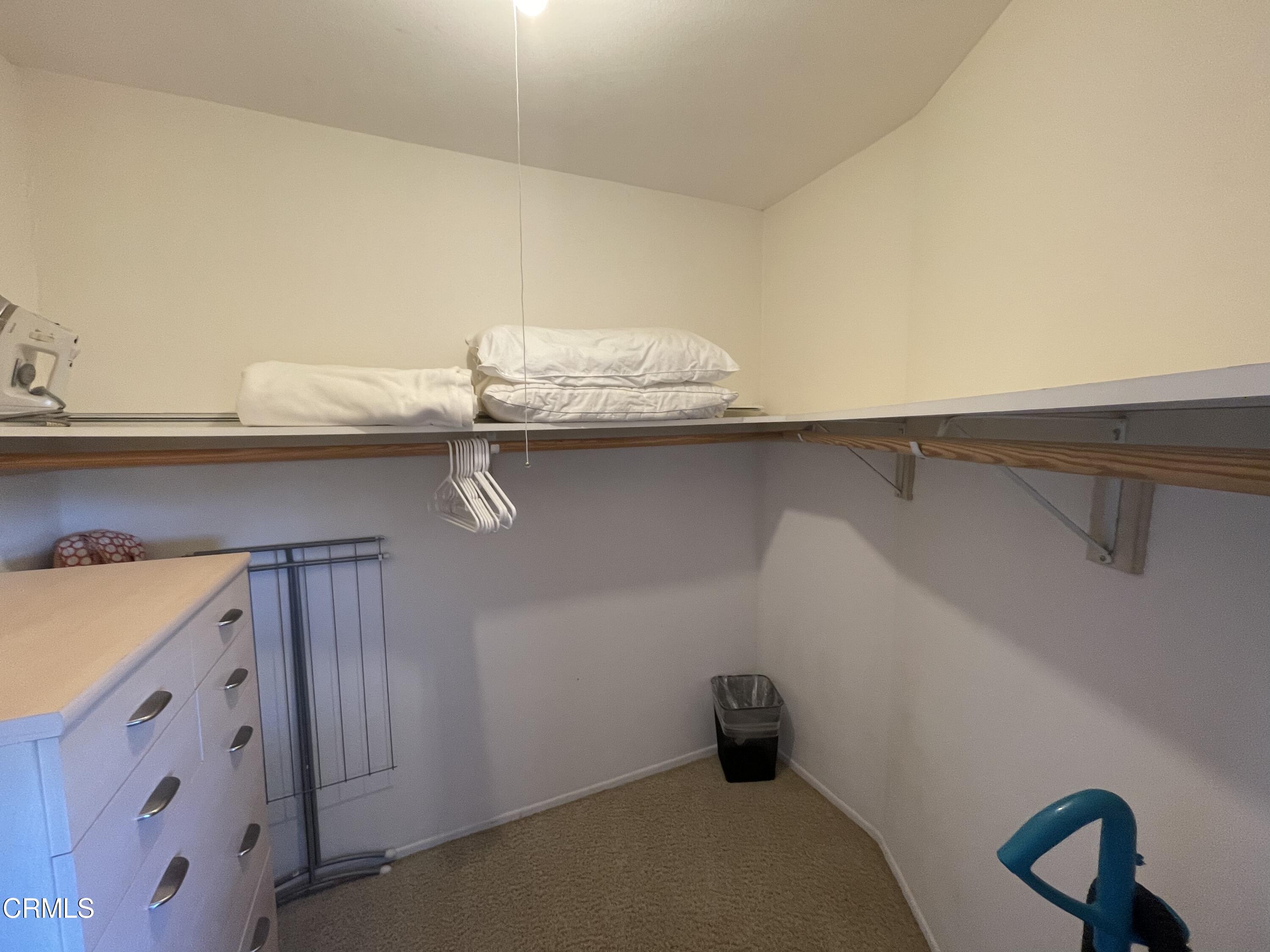 2901 Peninsula Road, Unit 144 Oxnard, CA 93035 - Photo 16 of 25 a view of cabinets and wooden floor