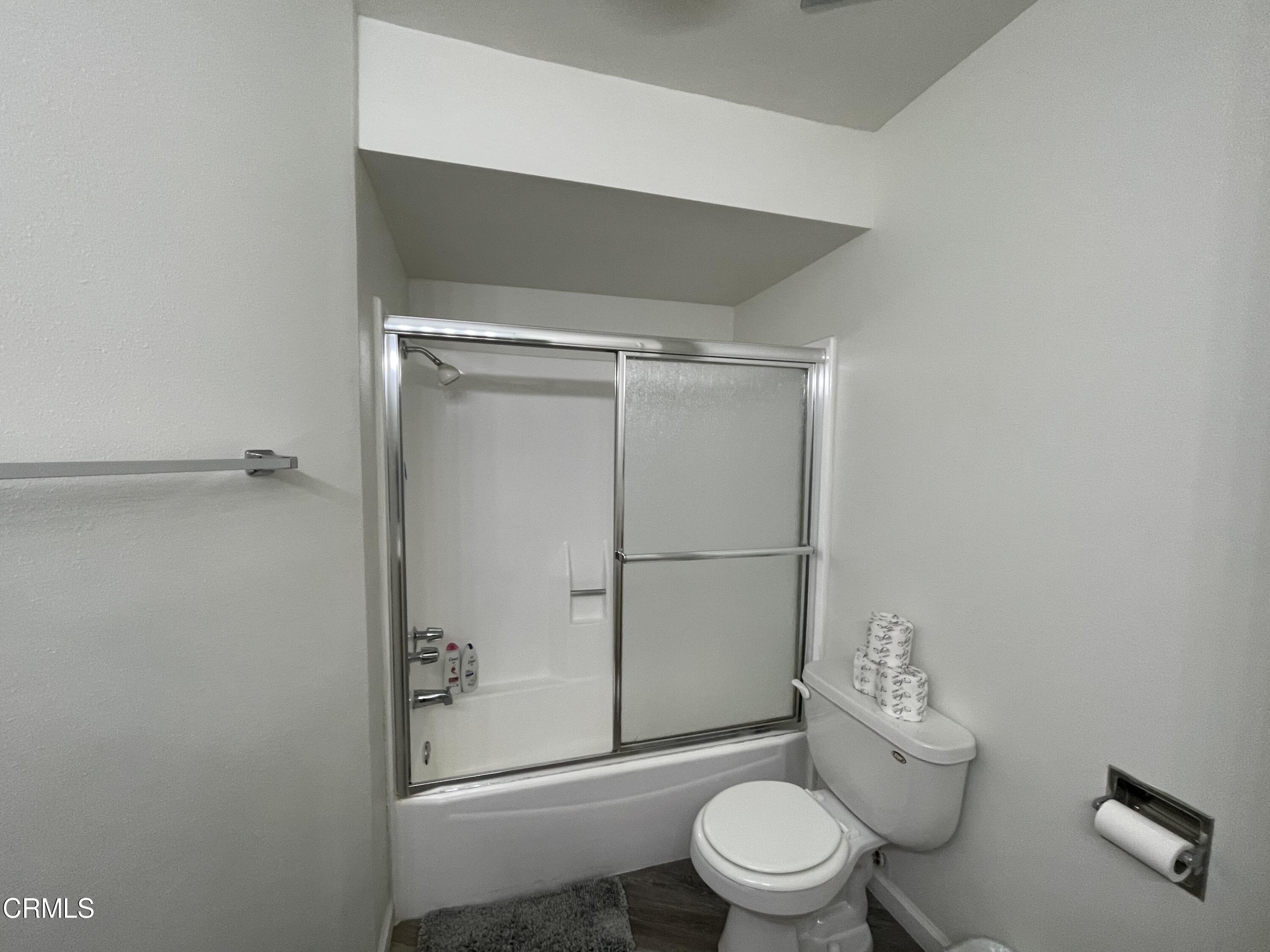 2901 Peninsula Road, Unit 144 Oxnard, CA 93035 - Photo 21 of 25 a white toilet sitting next to a bathroom sink