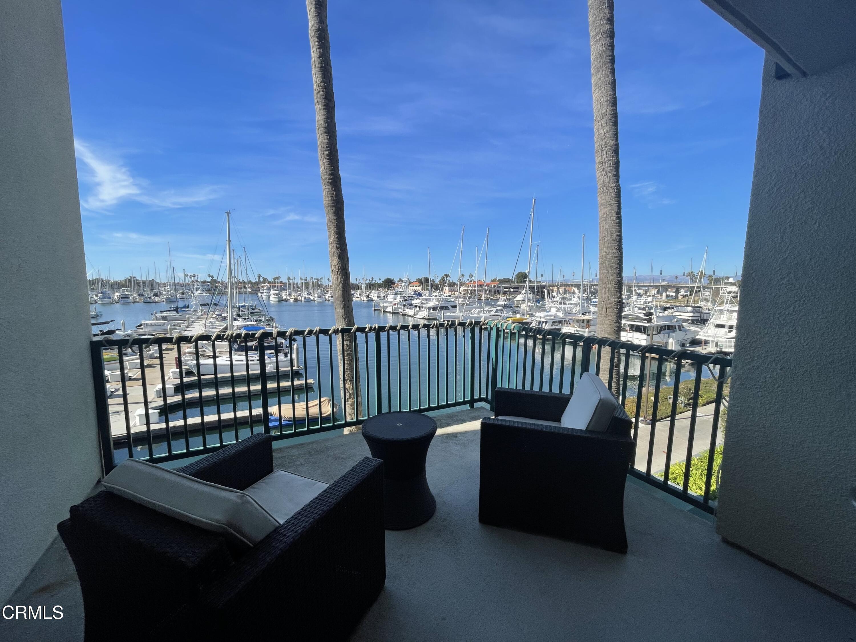 2901 Peninsula Road, Unit 144 Oxnard, CA 93035 - Photo 4 of 25 a view of a balcony with wooden floor