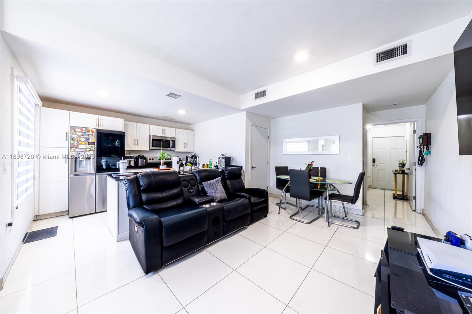 13966 Southwest 258th Street Homestead, FL 33032 - Photo 19 of 23 a living room with furniture and a large window