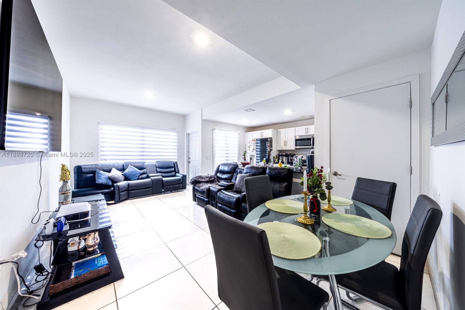 13966 Southwest 258th Street Homestead, FL 33032 - Photo 20 of 23 a living room with furniture kitchen view and a large window