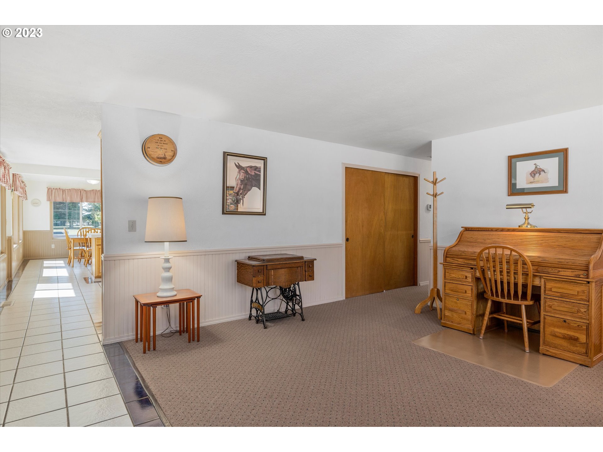9350 South Gribble Road Canby, OR 97013 - Photo 11 of 45 a bedroom with furniture and a chair
