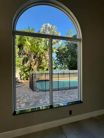 a large bathroom with a large tub and sink