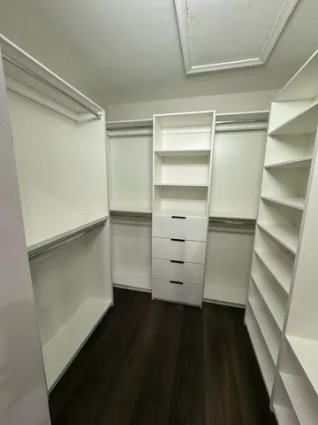 a kitchen with a sink and a refrigerator