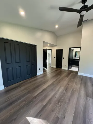 a view of backyard and garden