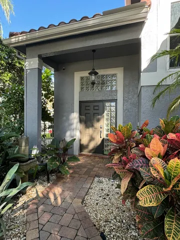 a kitchen with a stove and a refrigerator