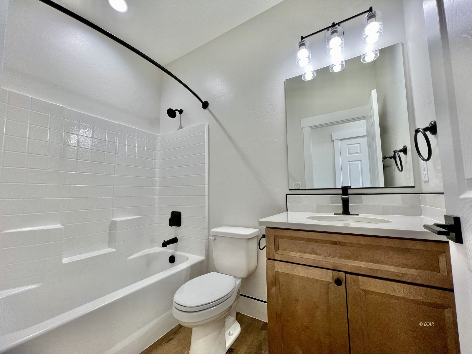 610 Ridgeway Drive Spring Creek, NV 89815 - Photo 17 of 33 a bathroom with a sink toilet and shower