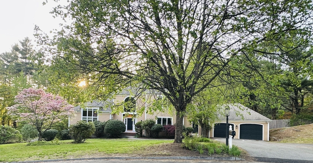 104 Channing Road Concord, MA 01742 - Photo 2 of 28 a front view of a house with garden