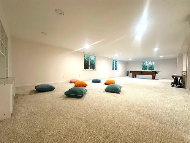 a bed room with furniture and a chandelier