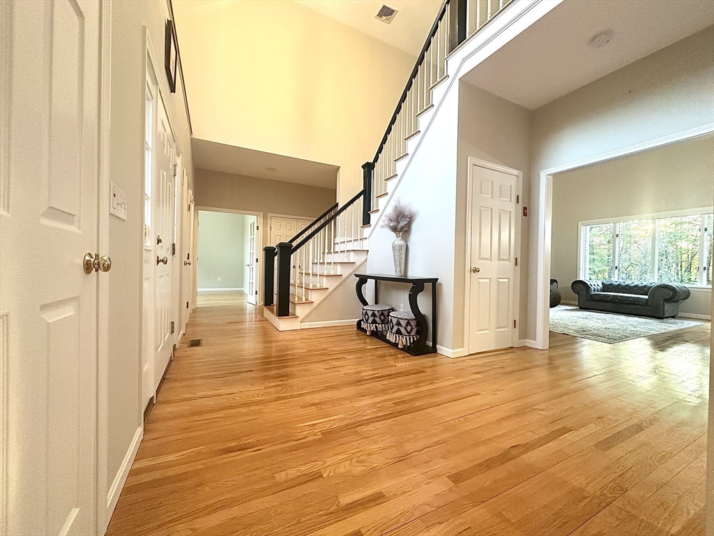 104 Channing Road Concord, MA 01742 - Photo 3 of 28 a view of an entryway with wooden floor
