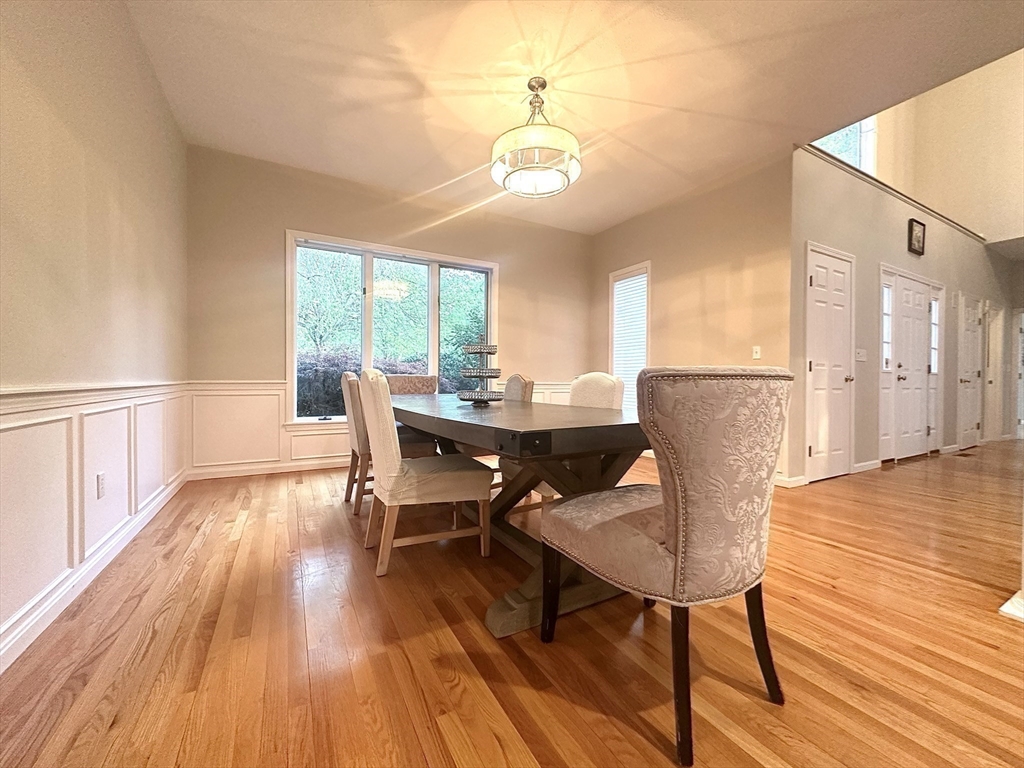 104 Channing Road Concord, MA 01742 - Photo 9 of 28 a view of a dining room with furniture window and wooden floor
